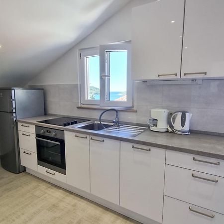 Apartments Miovic โมลูนัท ภายนอก รูปภาพ
